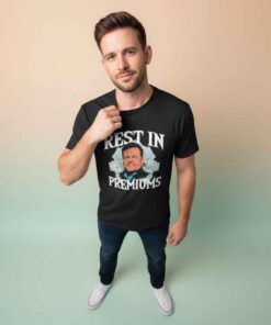 Rest in Premiums Brian Thompson parody shirt featuring bold satirical text and humorous meme-style design, perfect for fans of witty commentary, novelty streetwear, and edgy graphic tees.